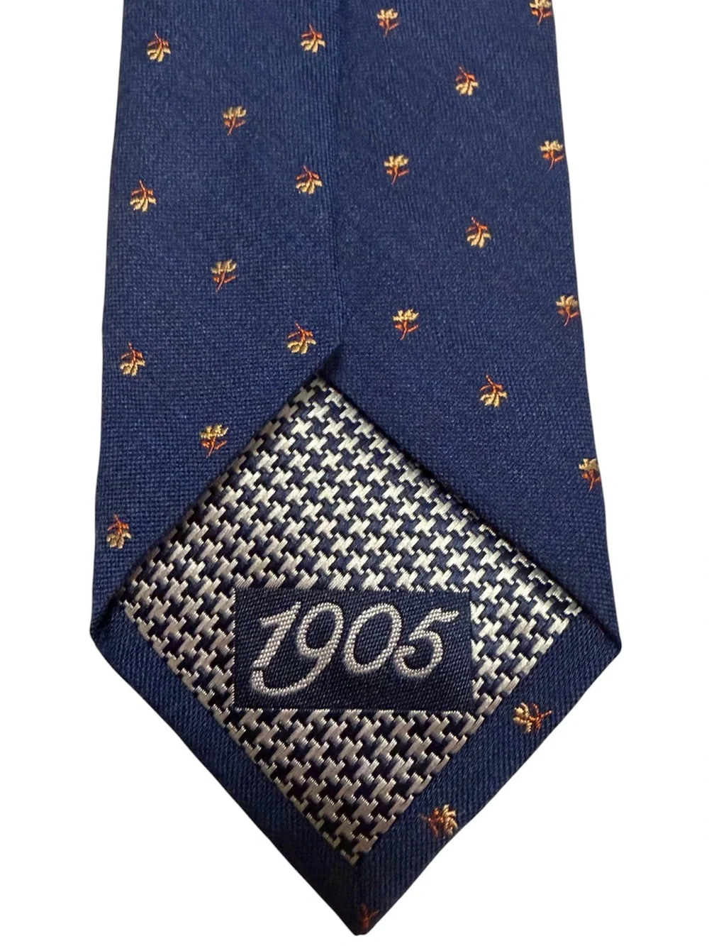 Jos. A. Bank Navy Tie with Small Gold Floral Motif
